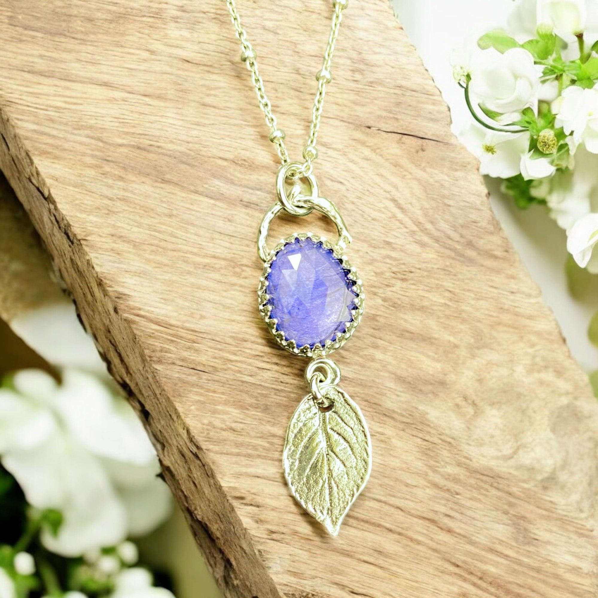 Reserved: Blue tanzanite Wild Rose Pendant