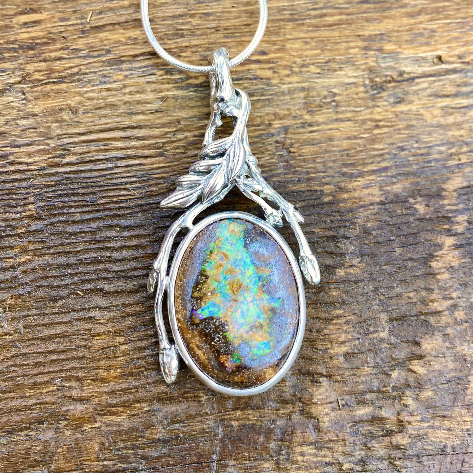 Abundant flow Boulder Opal Pendant
