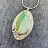 Unique natural Iron Maiden Turquoise Pendant